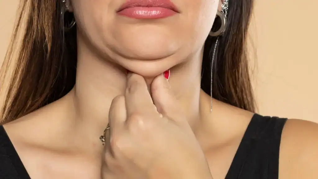 An image of a woman with double chin, sad, worried : Non Surgical Double Chin Removal Treatment in Coleshill, UK